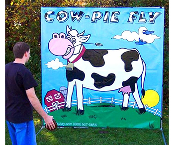 Cow-pie fly toss game